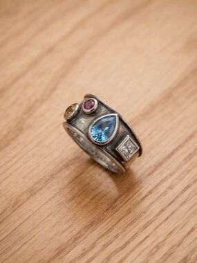 Source Unknown Silver Ring with Blue Teardrop and Multi-Colored Accent Stones